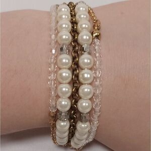 Multi strand beaded bracelet with gold clasp